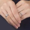 Angel Wings Promise Solitaire Rings on Couples Hand
