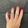 Heart-Shape-Black-Diamond-Engagement-Ring-on-hand