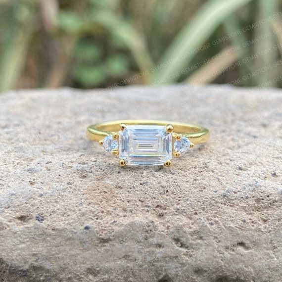 East West Emerald Cut Moissanite Three Stone Engagement Ring
