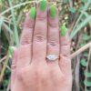 East West Emerald Cut Moissanite Three Stone Engagement Ring